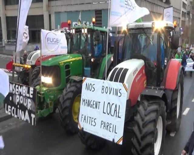 Brüksel'de on binlerce kişi iklim değişikliğini protesto için yürüdü