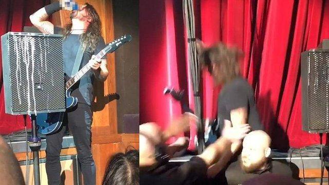 Dave Grohl seyircilerin verdiği içkiyi içtikten sonra...