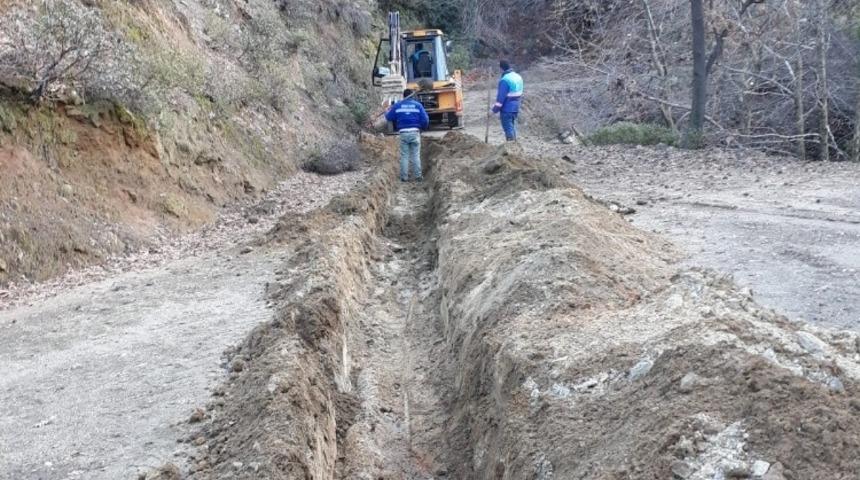ASKİ Kuyucak’ta sulama kanallarını temizledi