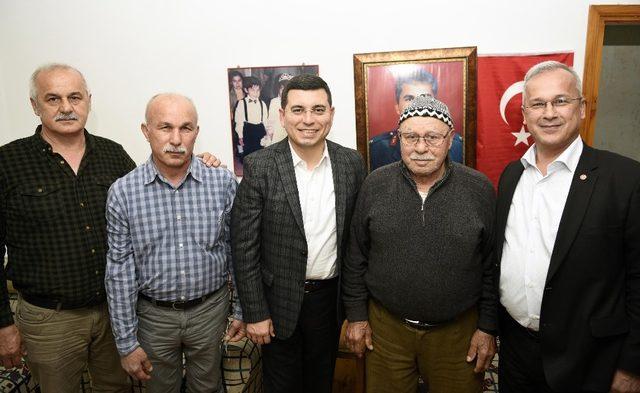 Tütüncü şehit ailelerini ziyaret etti