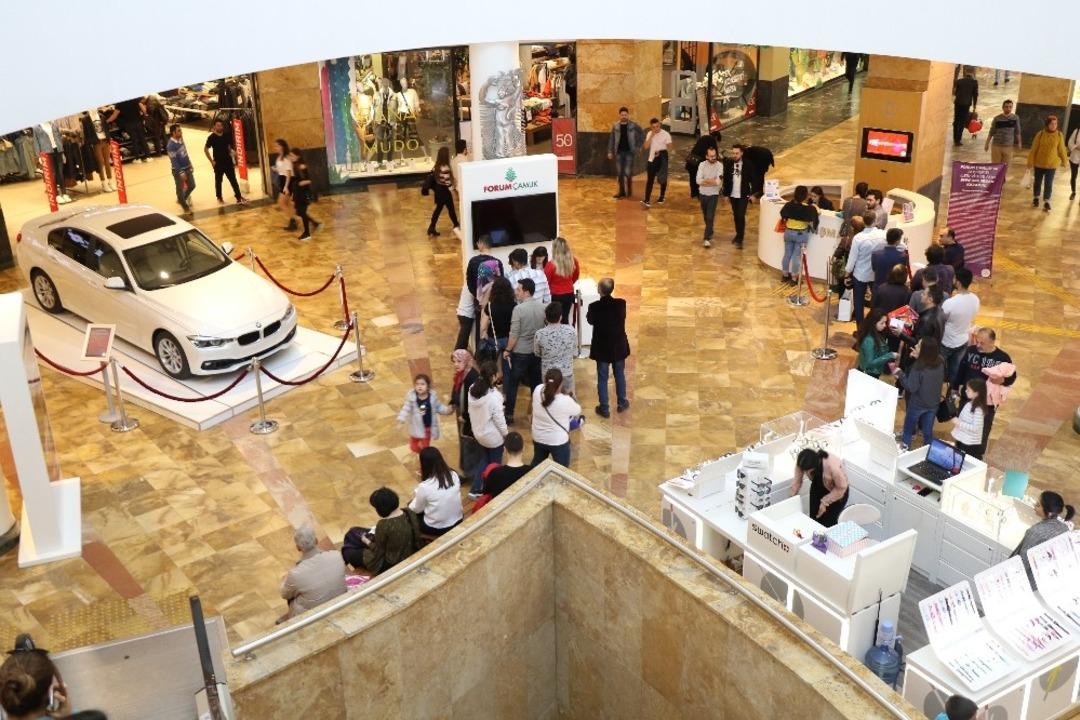 125 TL alışverişe BMW 318i Sedan kazanma şansı