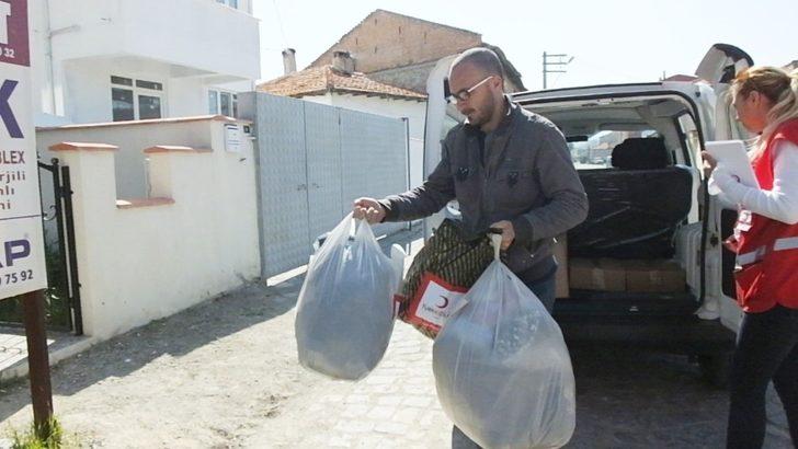 Burhaniye’de evi yanan aileye Kızılay sahip çıktı G2
