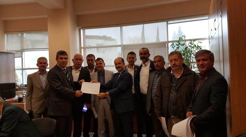 Muhtarlar mazbatalarını aldı