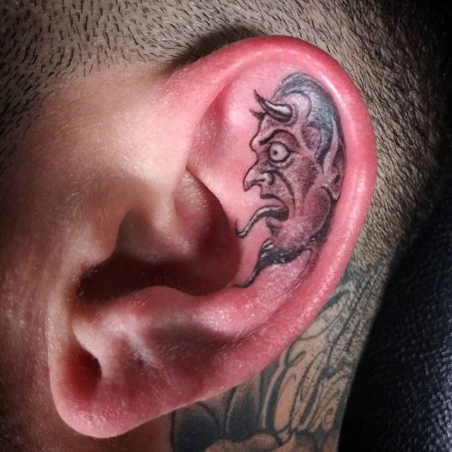 ear-tattoo-examples-21-5c8236574a951__700