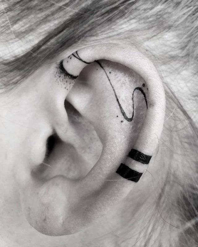ear-tattoo-examples-52-5c8238a0de1ea__700