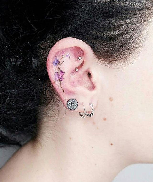 ear-tattoo-examples-62-5c82393f53fc5__700
