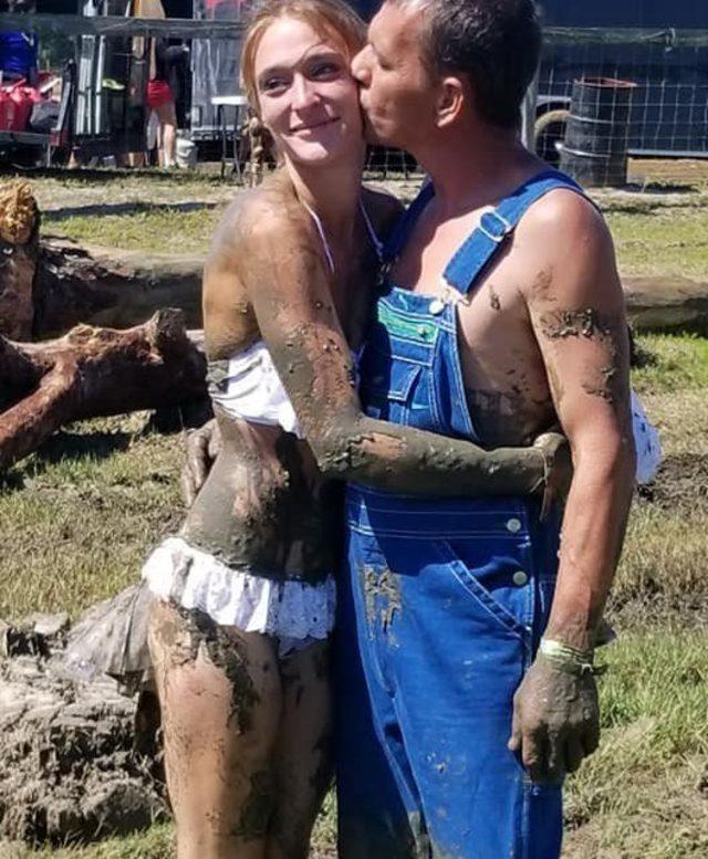 bride-wears-white-underwear-instead-of-a-traditional-wedding-dress-and-ties-the-knot-in-a-truck-before-mud-wrestling-her-husband