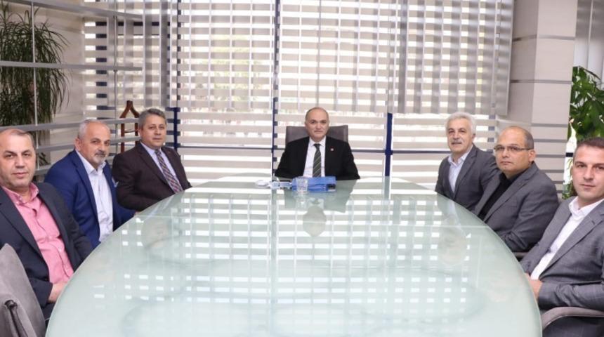 B&ouml;lge başkanı Taşlı ve y&ouml;netiminden Başkan &Ouml;zl&uuml;&rsquo;ye ziyaret