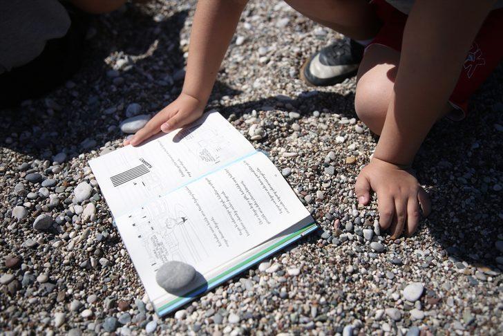 Dünyaca ünlü plaj bu kez kitapseverlere ev sahipliği yaptı G1