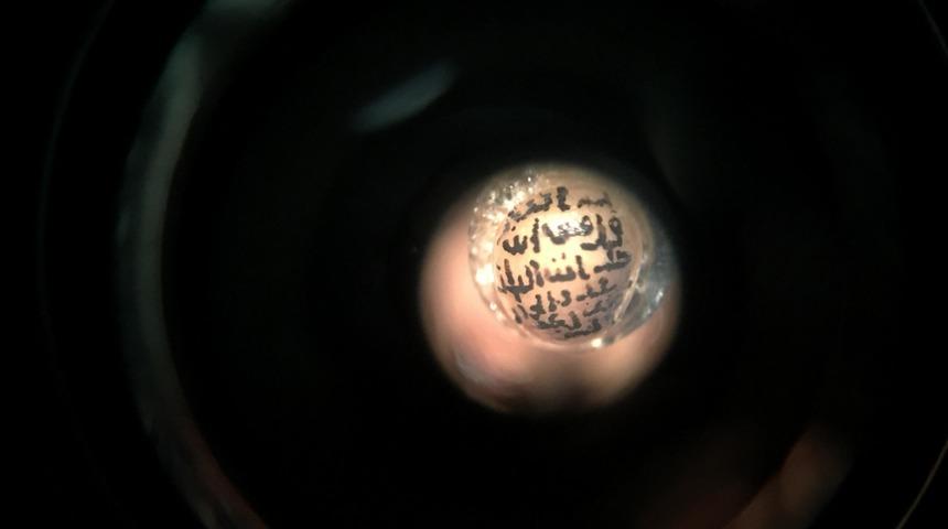 İhlas Suresi'ni 6 ayda incir &ccedil;ekirdeğine yazdı