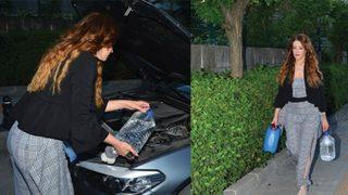 Esra Sönmezer otomobiline bidonlarla su taşıdı