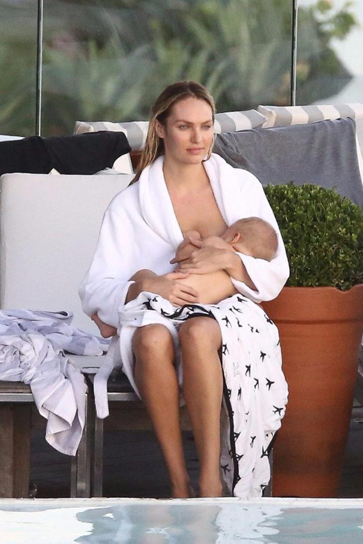 Çekim arasında bebeğini emzirdi G1