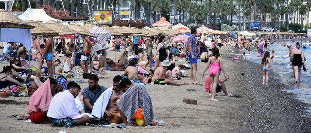 Marmaris'te plajlar ve yürüyüş yolları tatilcilerle doldu