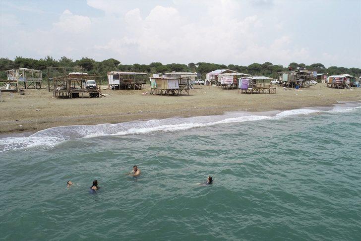 Antalya'da 5 yıldızlı otellerin yanı başında 'çardaklı' tatil! Gören şaşırıyor G5