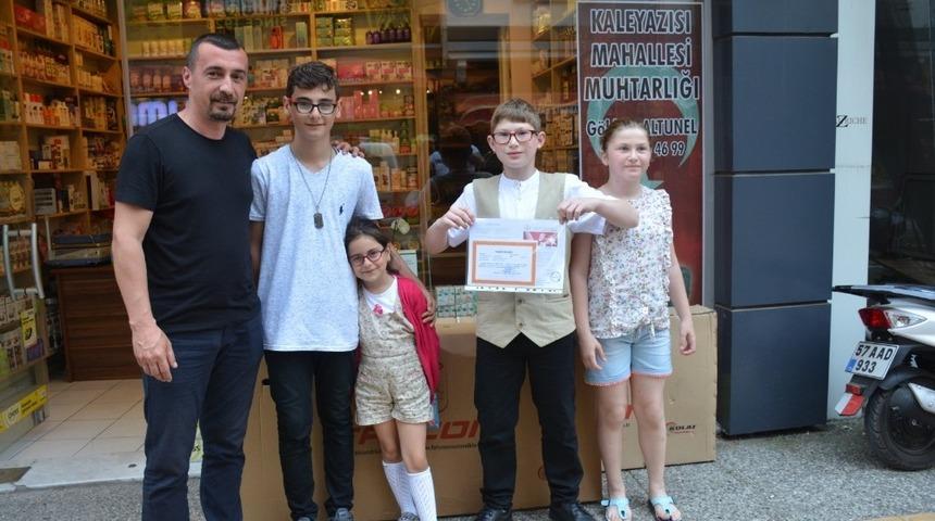 Muhtardan en &ccedil;ok kitap okuyan &ouml;ğrencilere bisiklet