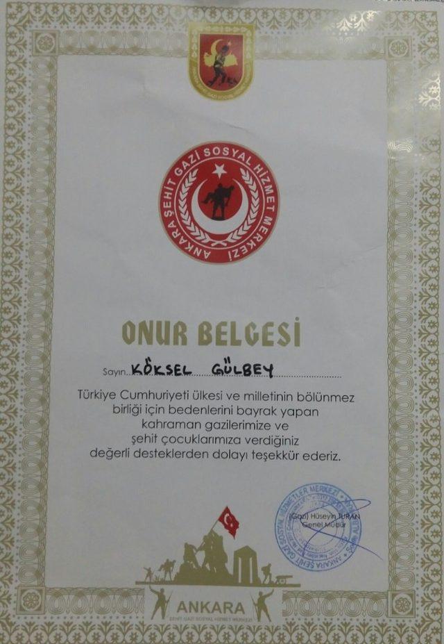 Başkan Gülbey’e onur belgesi verildi