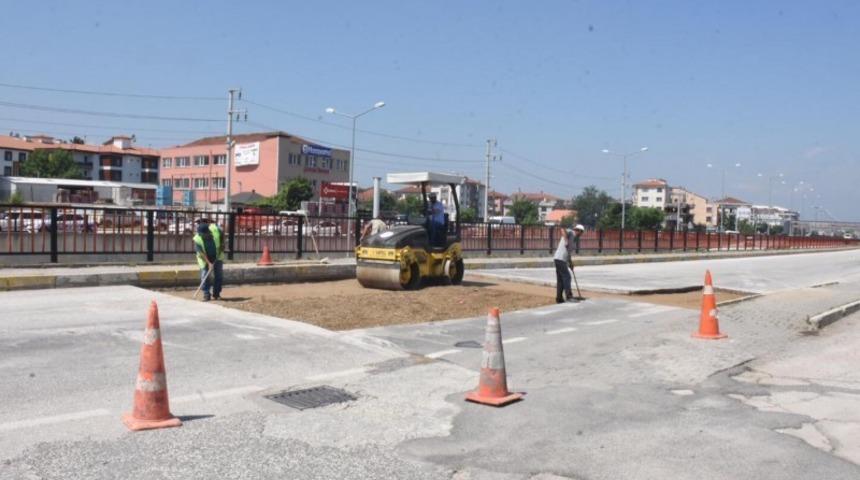 &Ccedil;oban kavşağında asfalt yama &ccedil;alışması