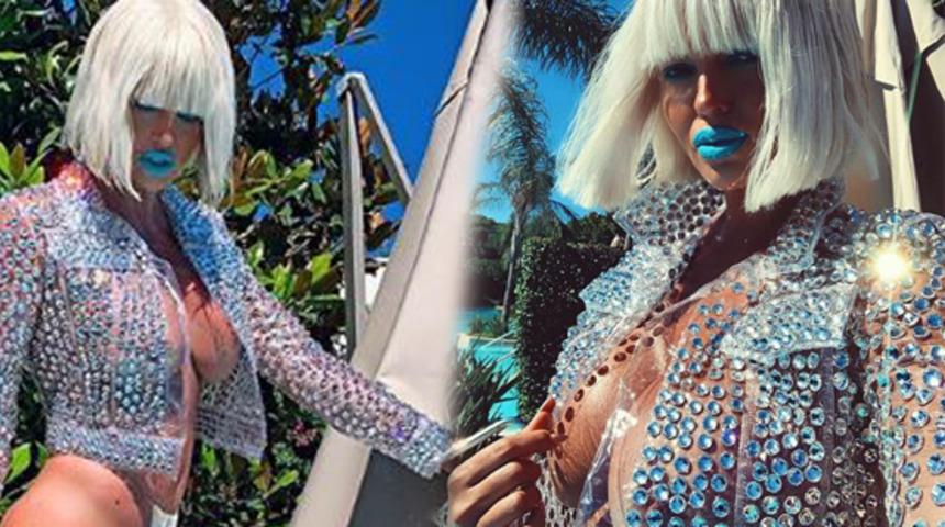  Jelena Karleusa ceket ve topuklu ayakkabıyla havuza girdi