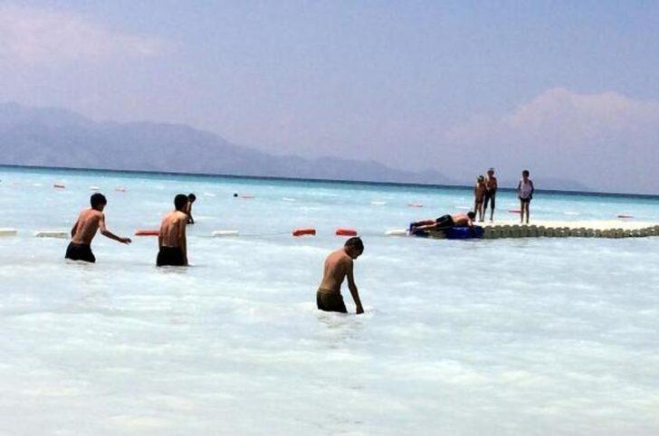 Burası ne Antalya ne de Bodrum! Plaj dolup taştı G2