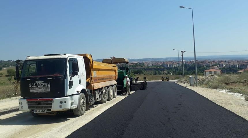 Yeni yerleşim yerlerinde asfalt &ccedil;alışmaları s&uuml;r&uuml;yor