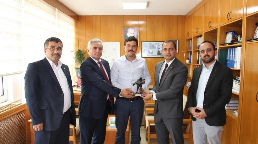 Dumlupınar heyeti K&uuml;tahya&rsquo;da kurum m&uuml;d&uuml;rlerini ziyaret etti