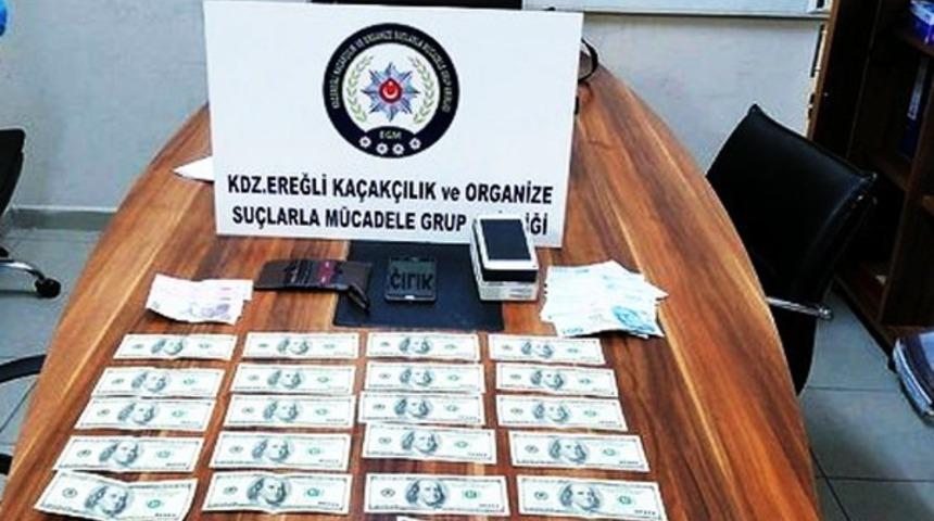 Piyasaya sahte dolar s&uuml;ren zanlılara g&ouml;zaltı