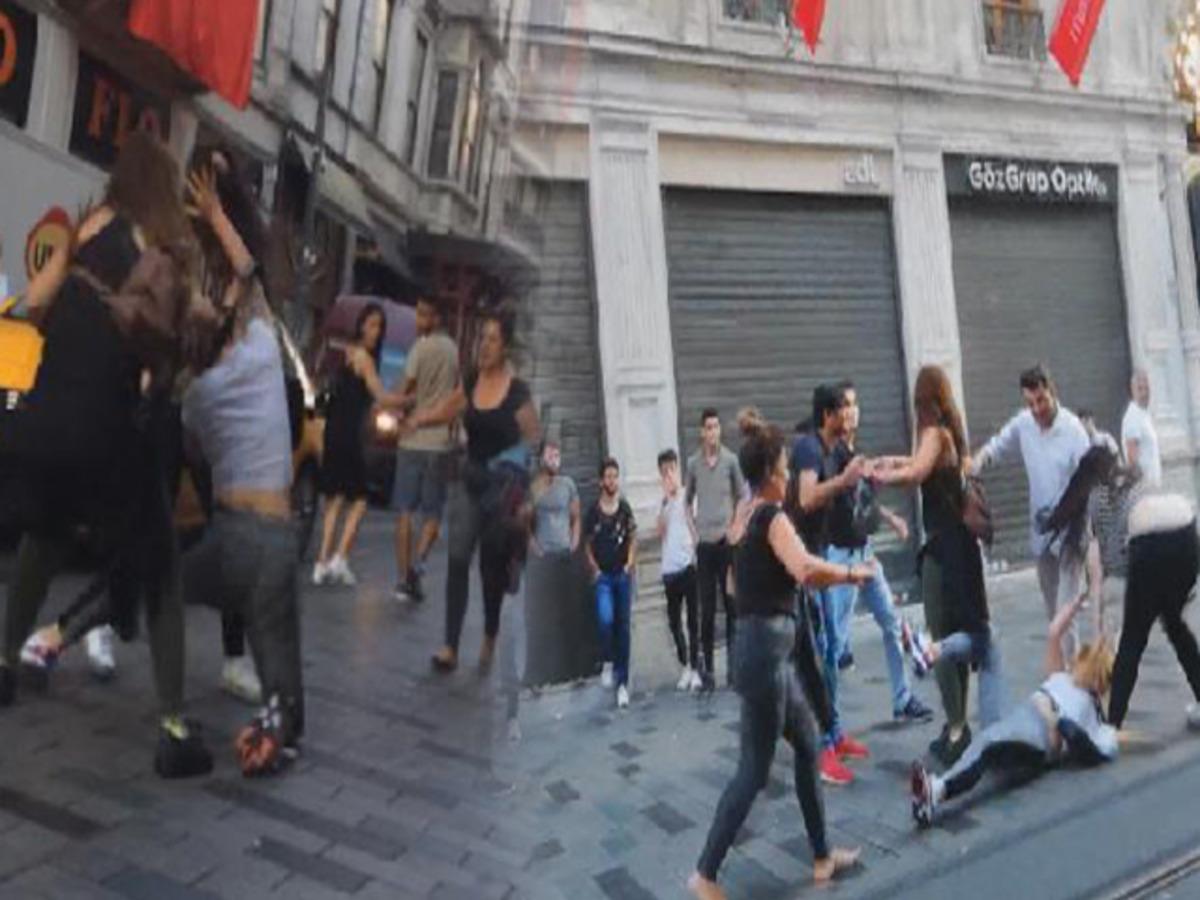 Taksim'de iki grup birbirine girdi! Polis m&uuml;dahale etti