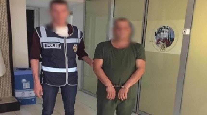 Eşinin evine silahla gelen koca tutuklandı