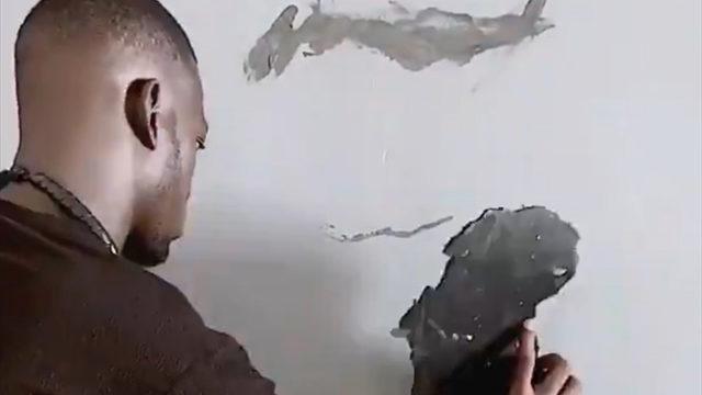 Güney Afrika'daki şiddete, gözü yaşlı Mandela resmi ile tepki