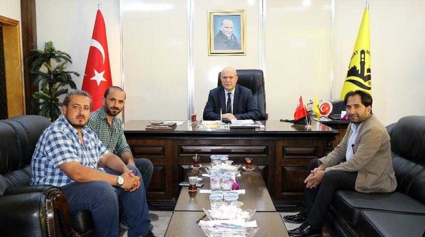 İHA Erzincan B&ouml;lge M&uuml;d&uuml;r&uuml; Akbuğa, Belediye Başkanı Pekmezci&rsquo;yi ziyaret etti