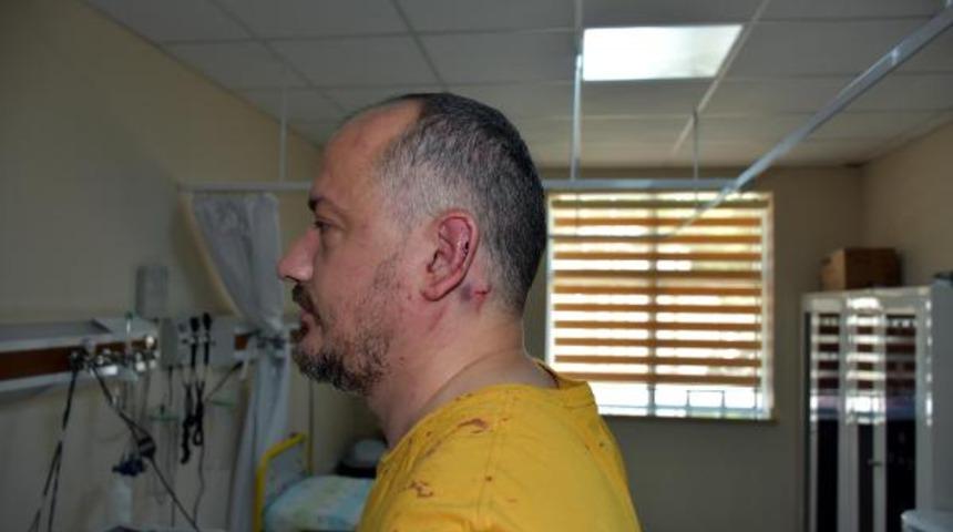 Gezgin Fatih Koparan'a dükkanının önünde sopalı saldırı