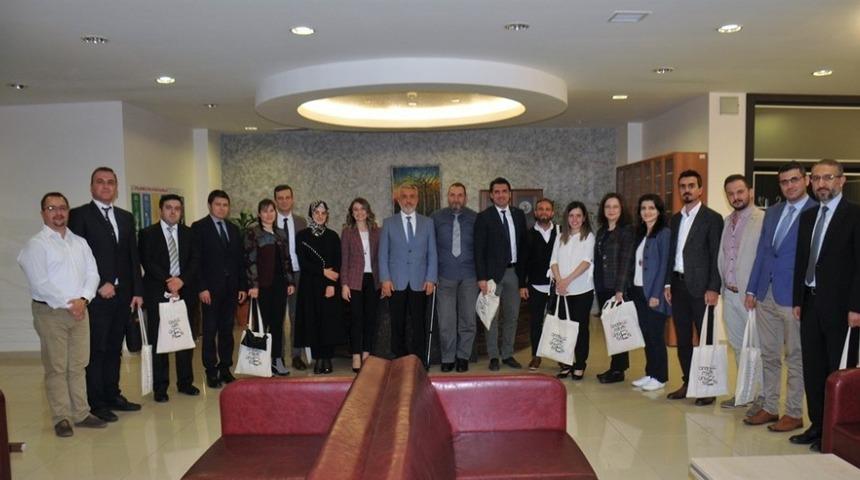 Rekt&ouml;r Bilgi&ccedil; akademik aşama kaydeden akademisyenleri tebrik etti