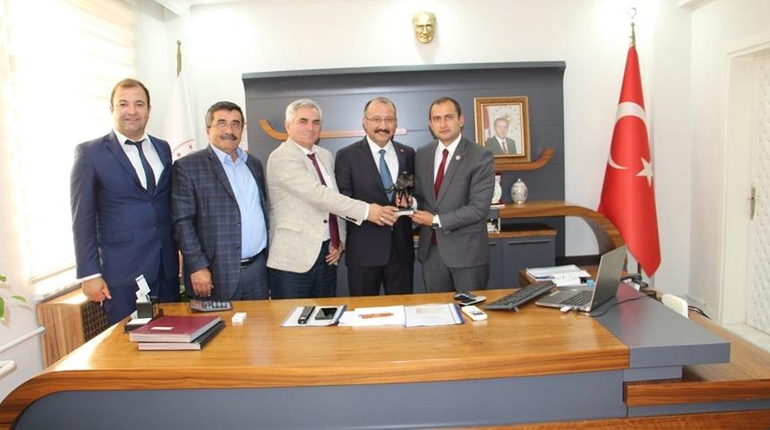 Dumlupınar protokolünden Özçalık’a ’Hayırlı olsun’ ziyareti