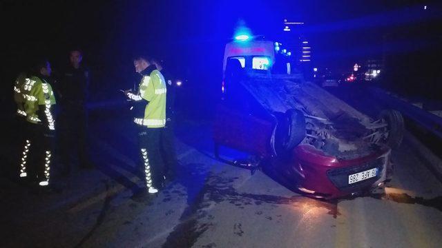 Şoka giren sürücü, takla atan araçtan çıkmadı