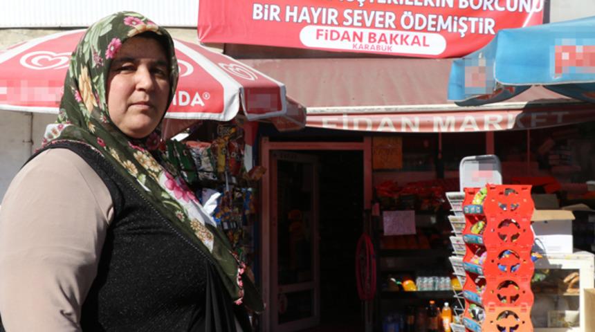 Mahalle bu pankartı konuşuyor! Veresiye defterindeki borçları kapattı