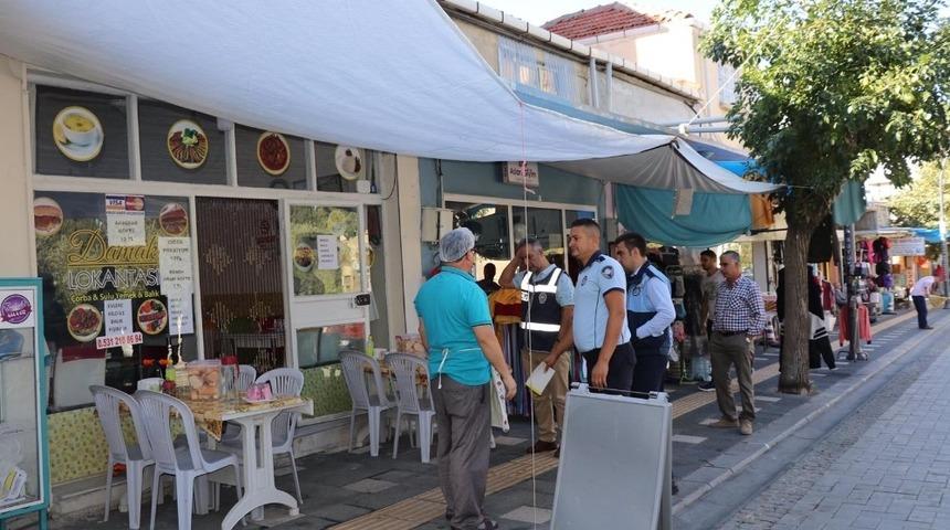 Manisa B&uuml;y&uuml;kşehir zabıtasından kaldırım işgali denetimi