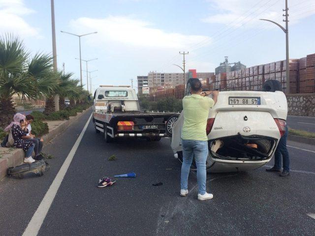 Takla atan otomobilden yara almadan kurtuldular