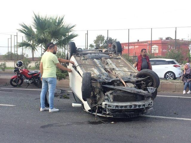 Takla atan otomobilden yara almadan kurtuldular