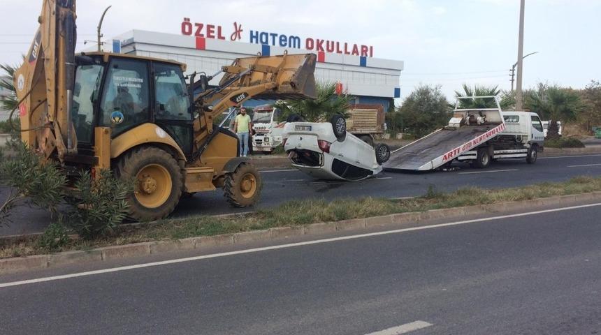 Takla atan otomobilden yara almadan kurtuldular