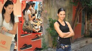 Ayakkabı alırken gazetecilere danıştı