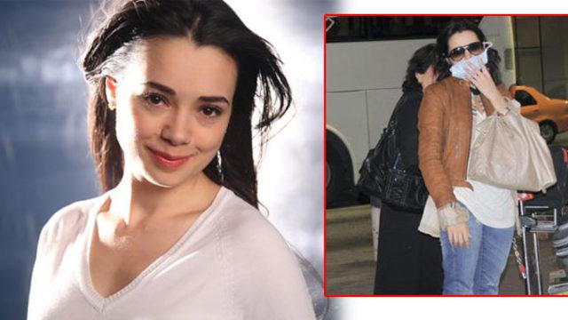 Özgü Namal maskeyle dolaşıyor