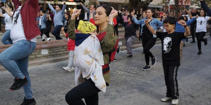 Kucağında bebeğiyle zeybek oynayan anne, Türkiye'nin ilgi odağı oldu G1