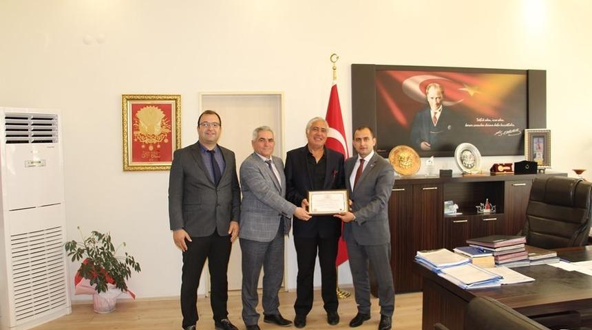 Arif Güler’e ’Fahri hemşehrilik’ beratı