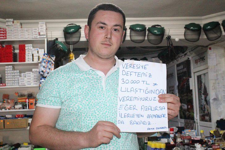 Esnafın alacakları için astığı yazılar şaşkına çevirdi G2