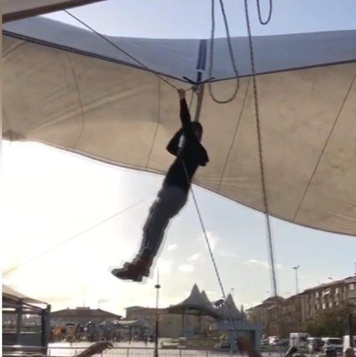 Rüzgarda çadırın ipini bırakmayan pazarcı metrelerce yükseldi  G2