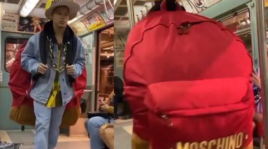 Metro defilesi! Moschino büyük şapka ve çanta modelleriyle sosyal medyaya damga vurdu