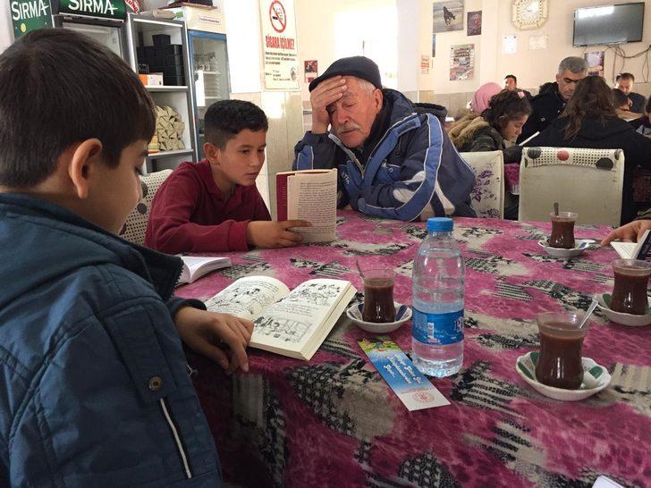 Öğrencilerden kıraatanede kitap okuma etkinliği G5