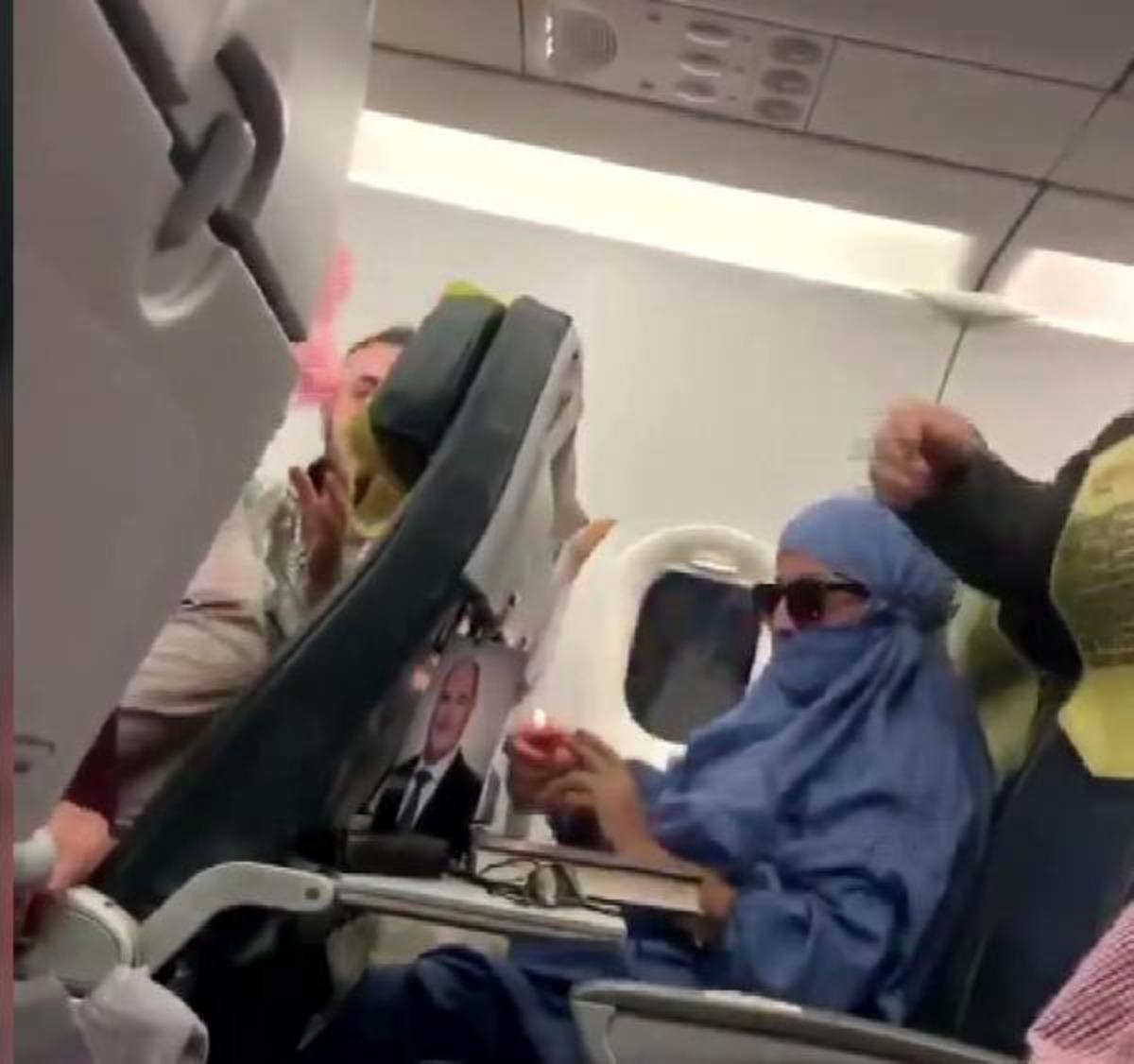 "Ben FET&Ouml;'c&uuml;y&uuml;m, u&ccedil;ağı patlatacağım" diye bağıran kadının polis oğlu da tanıdık &ccedil;ıktı