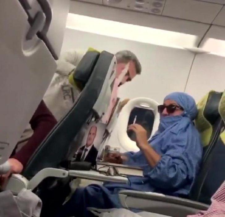 "Ben FETÖ'cüyüm, uçağı patlatacağım" diye bağıran kadının polis oğlu da tanıdık çıktı G1