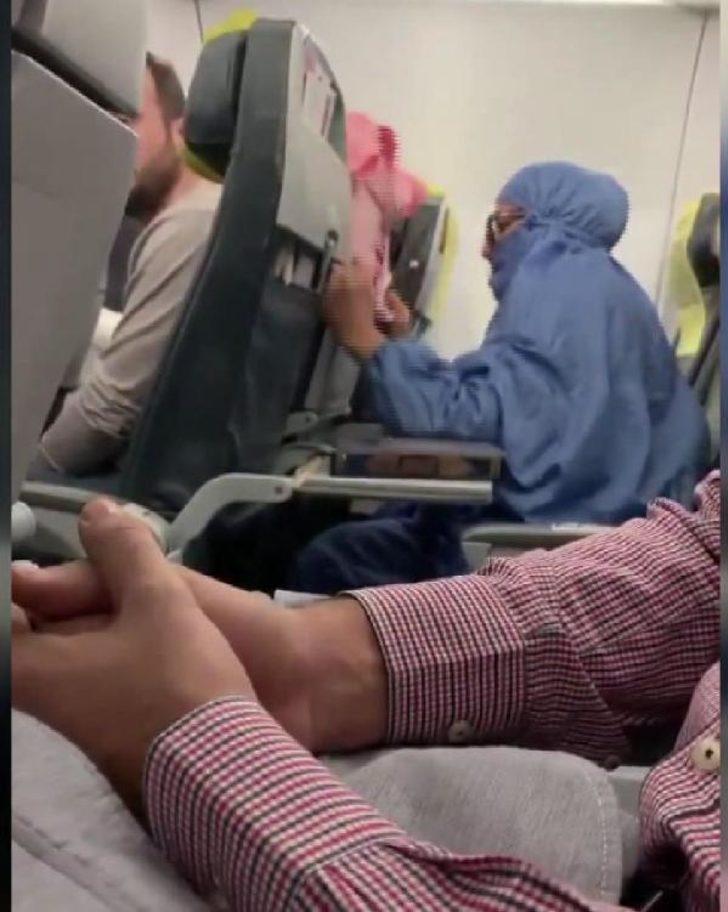 "Ben FETÖ'cüyüm, uçağı patlatacağım" diye bağıran kadının polis oğlu da tanıdık çıktı G4